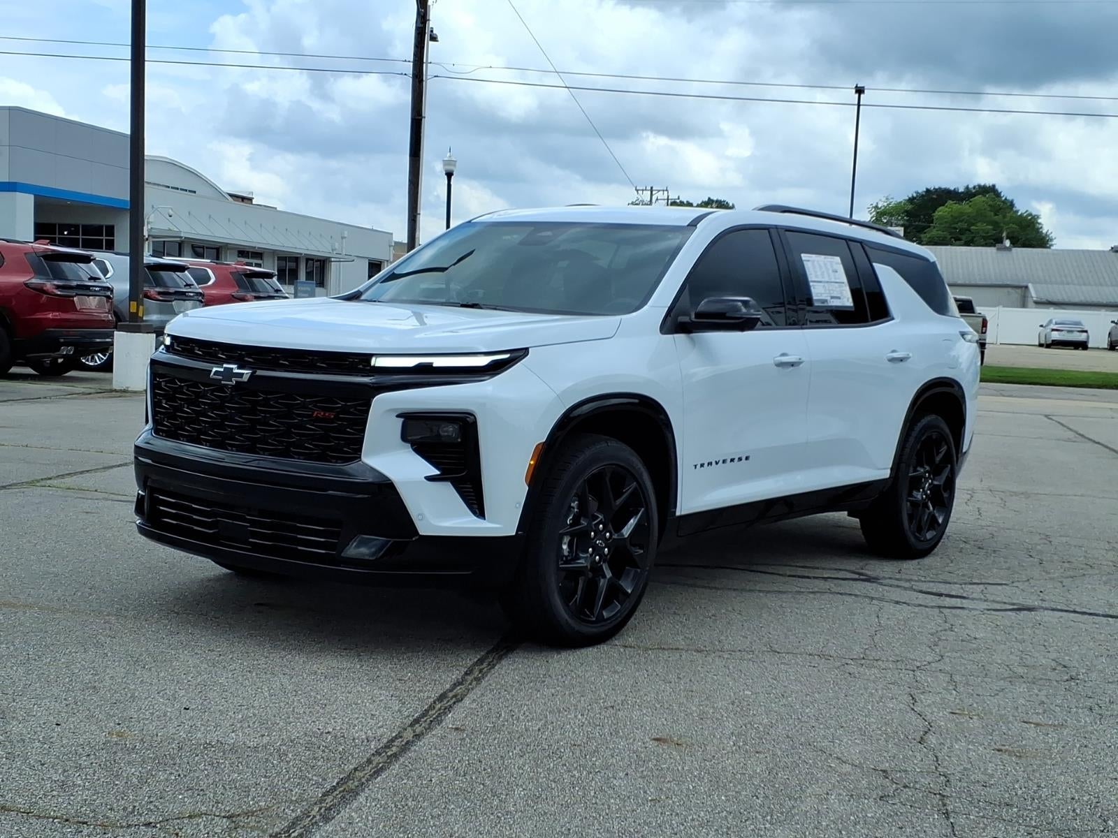 2026 Chevrolet Traverse RS in Polar White Tricoat — front three-quarter view