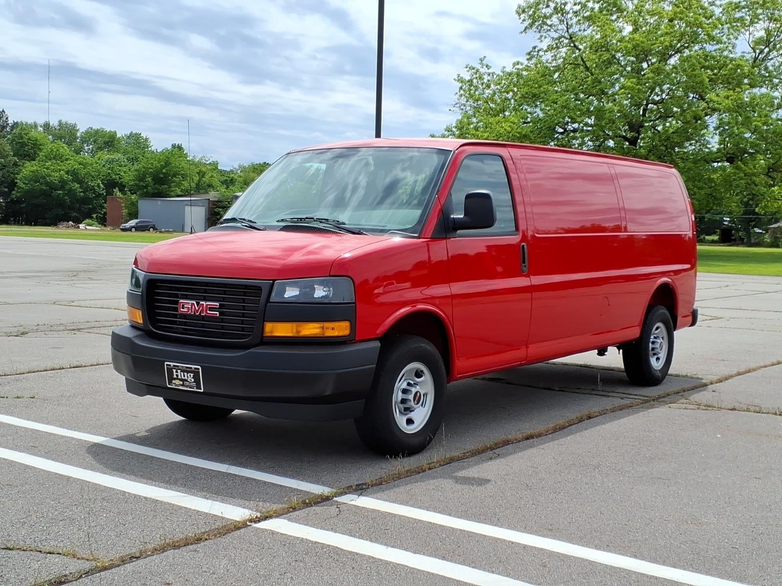 2026 GMC Savana Cargo Work Van in Cardinal Red — front three-quarter view