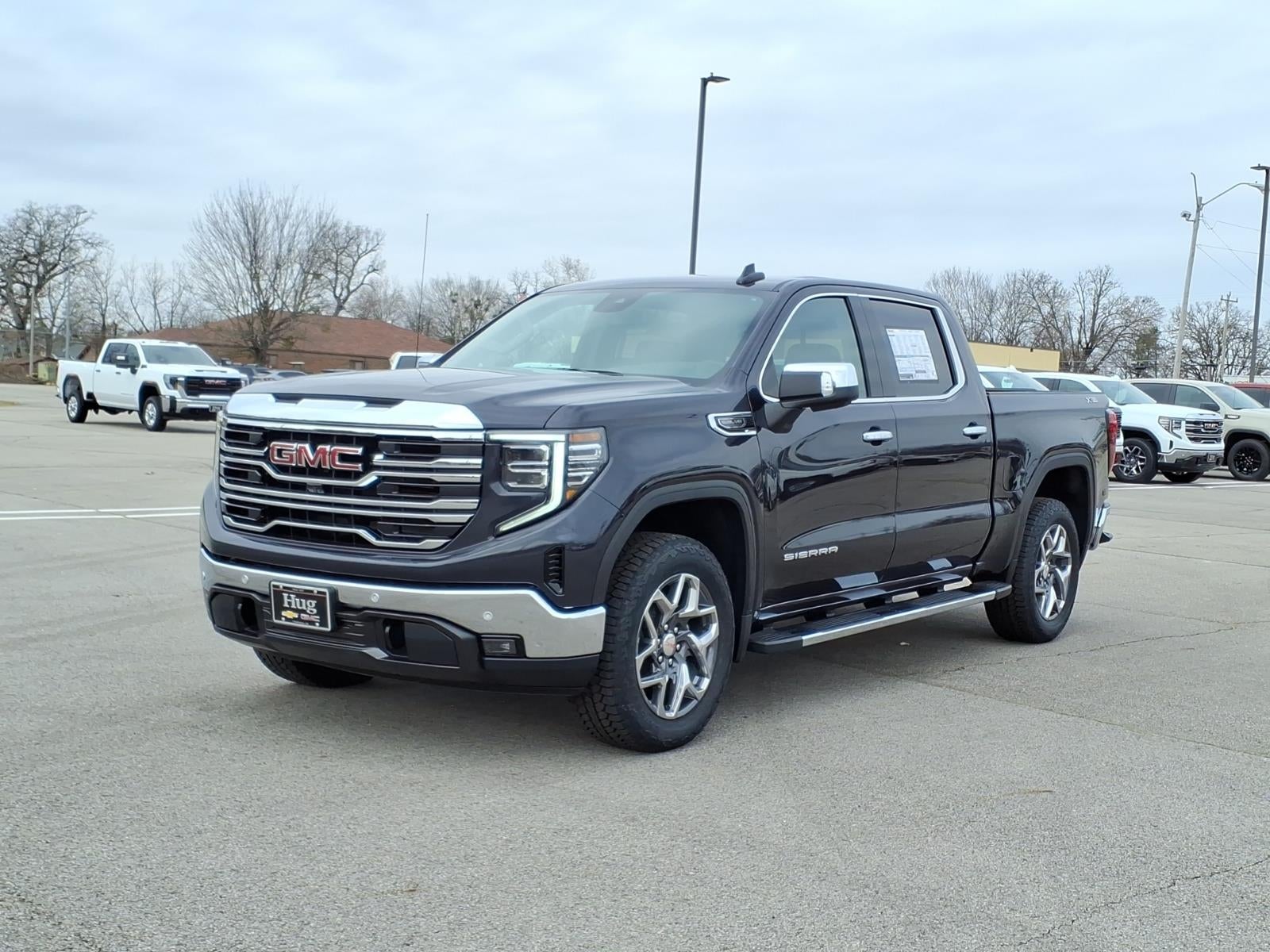 2026 GMC Sierra 1500 SLT in Titanium Rush Metallic — front three-quarter view